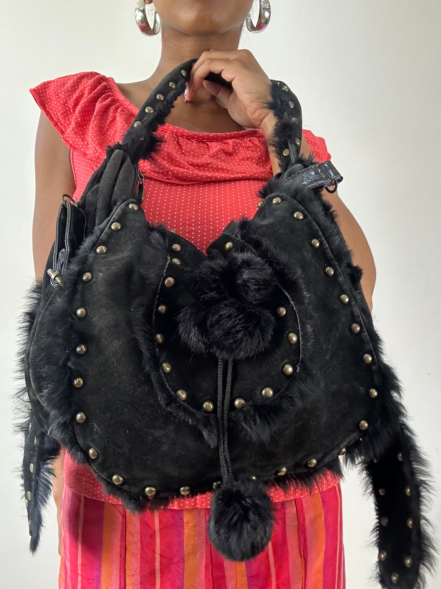 vintage edit twenty-seven | black studded faux fur shoulder bag with pom pom details