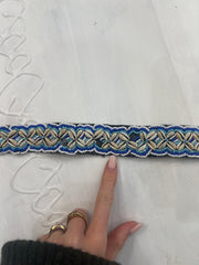 color: azul + blanco · prenda: cinturón · detalles: conchas + 🐚 + #47