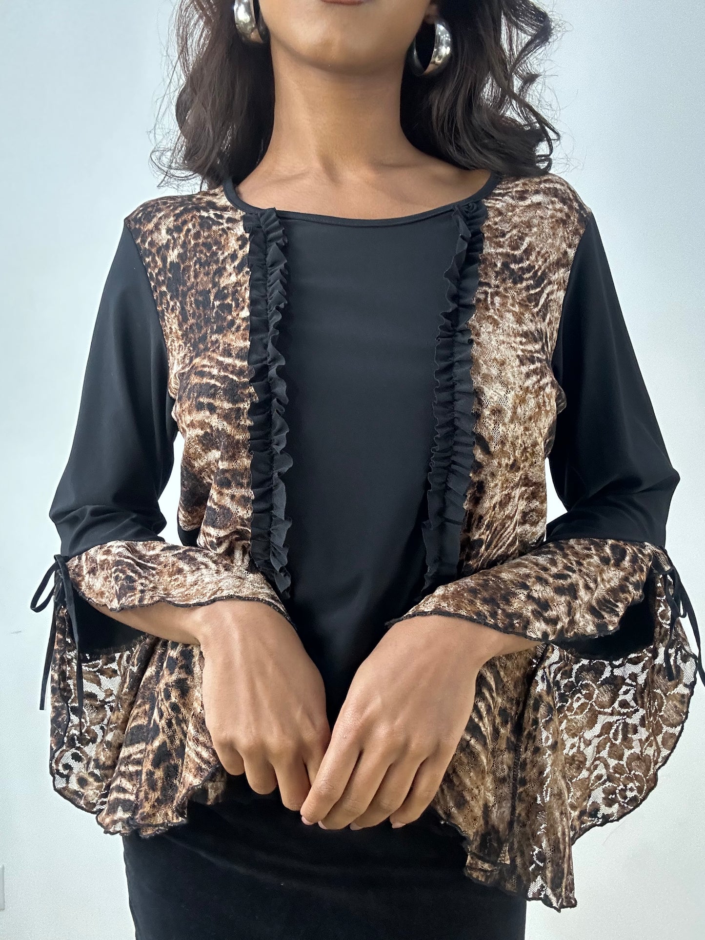 BEST PICKS | small black long sleeve top with leopard print panels