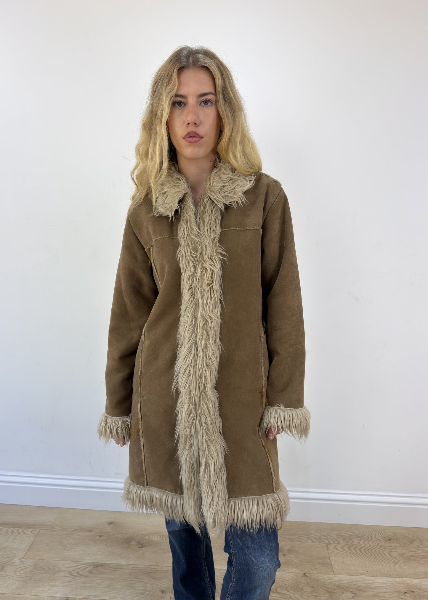 medium beige afghan faux fur coat - face close-up