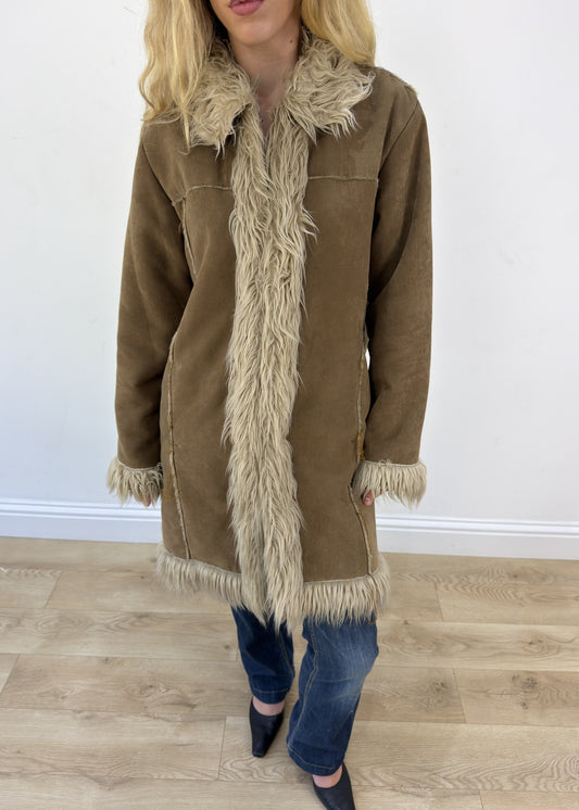 medium beige afghan faux fur coat - aesthetic close-up