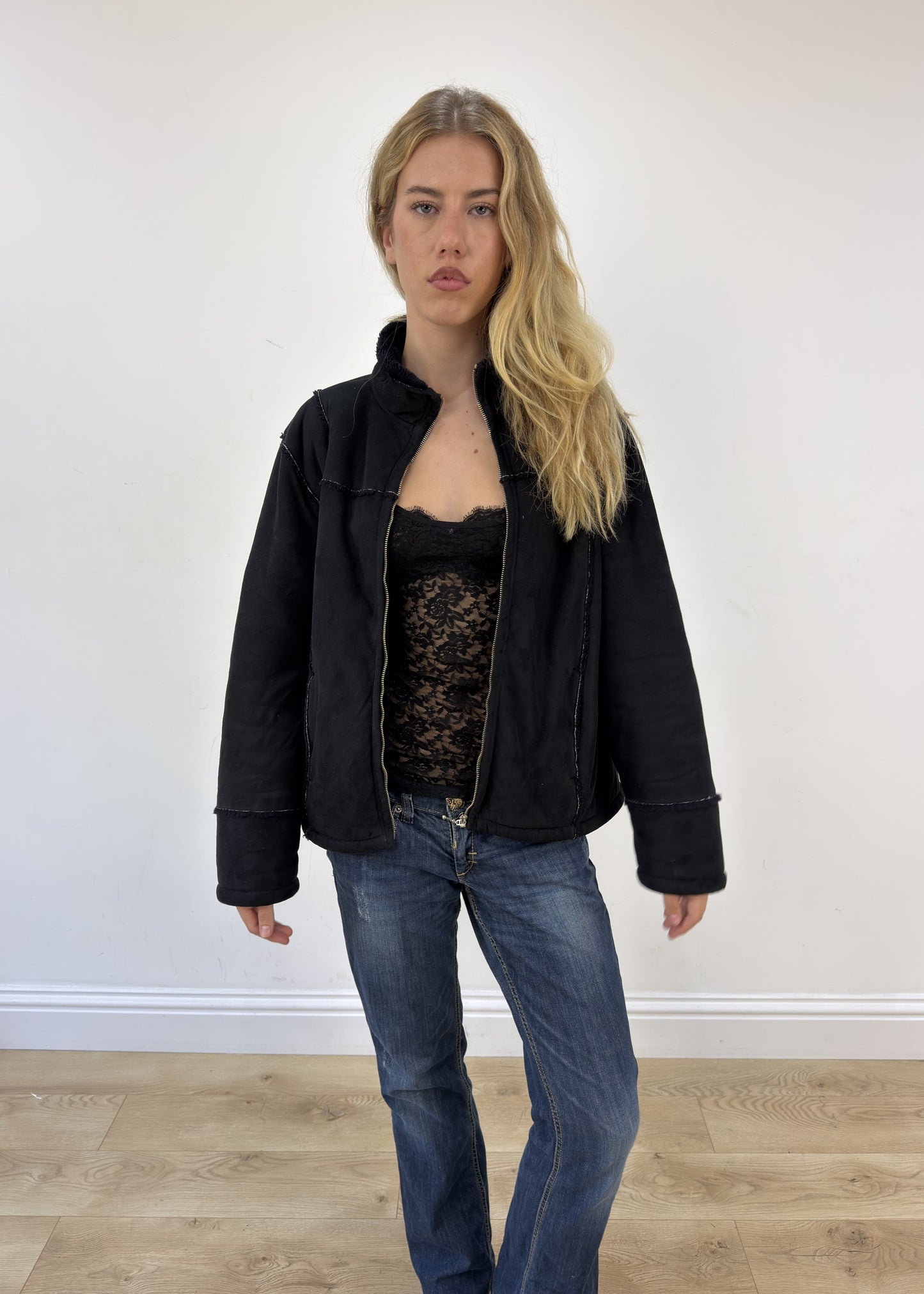 small black suede jacket with fur lining open or unzipped view