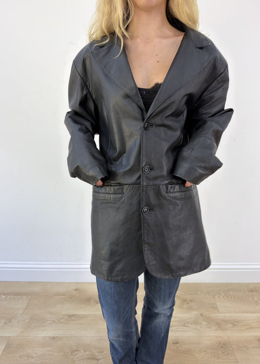 large black faux leather long jacket - aesthetic close-up
