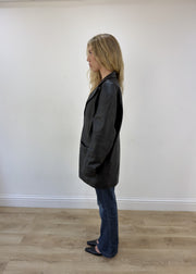 large black faux leather long jacket - side view