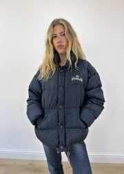 large navy Replay puffer jacket - face close-up