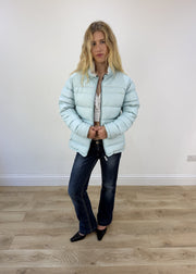 small pale blue puffer jacket open or unzipped view