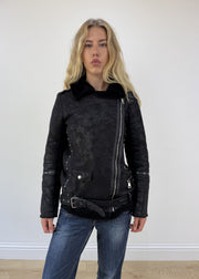 medium black fluffy studded jacket - face close-up
