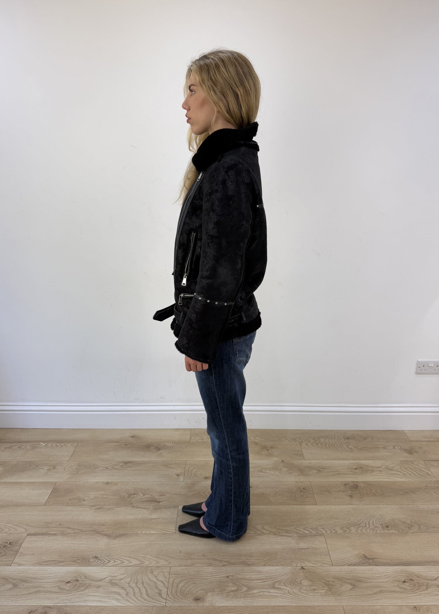 medium black fluffy studded jacket - side view