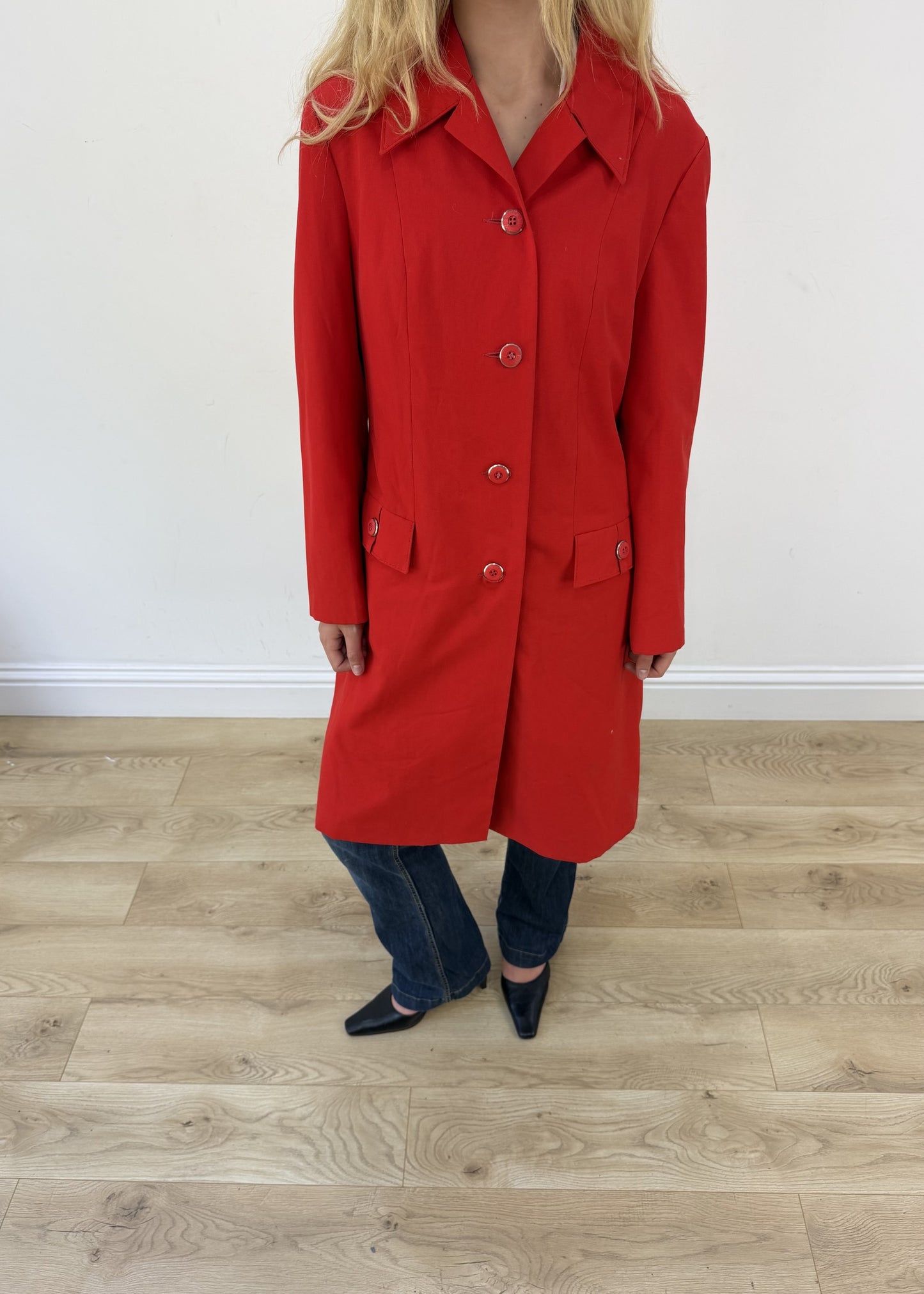 medium red trench coat - aesthetic close-up