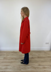 medium red trench coat - side view