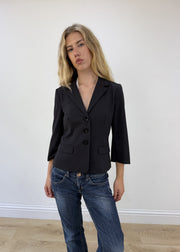 medium black pinstripe blazer - face close-up