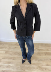 medium black pinstripe blazer - aesthetic close-up