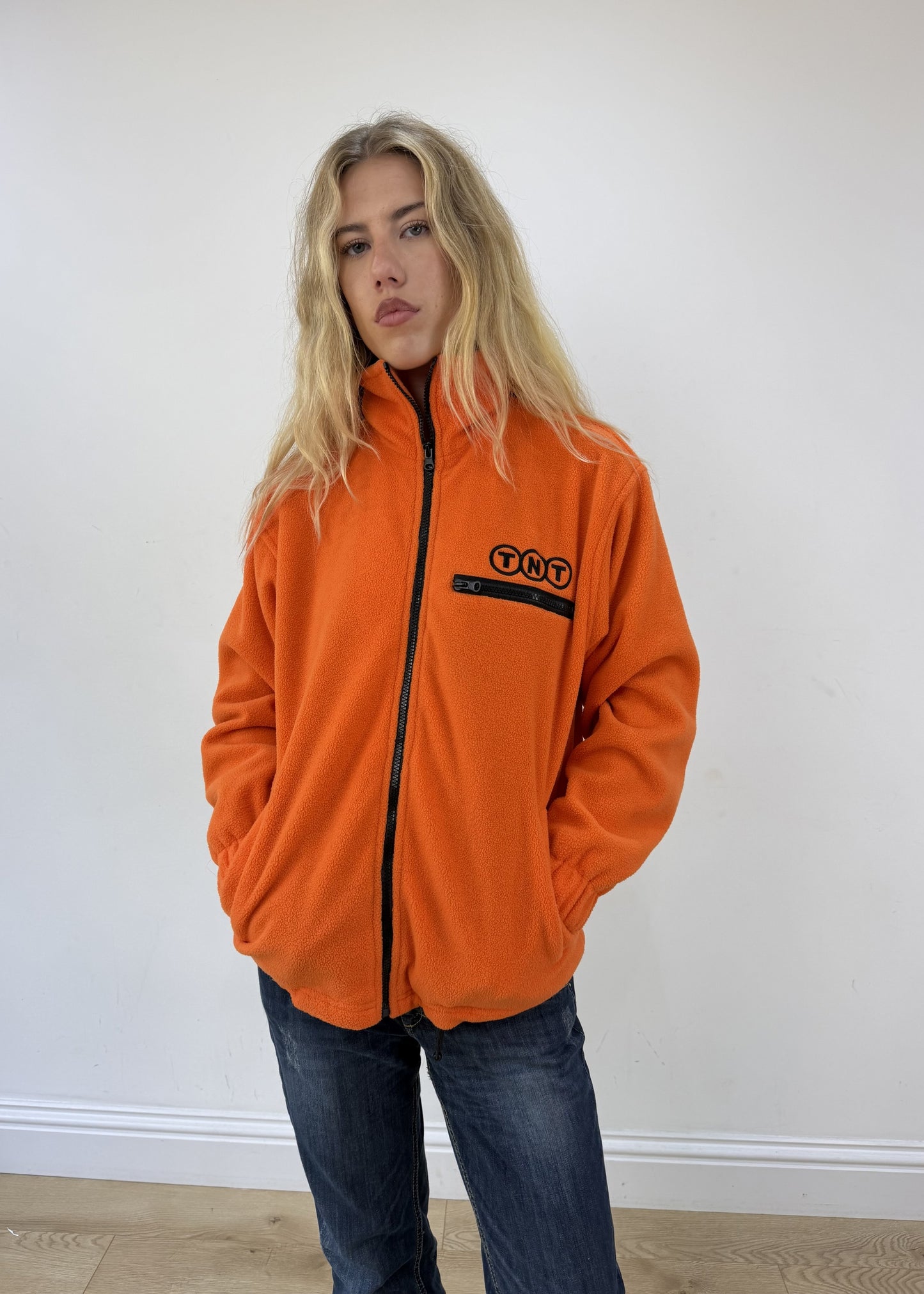 extra large orange TNT zip fleece - face close-up