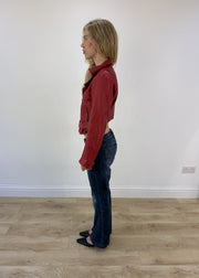 small red faux leather belted jacket - side view