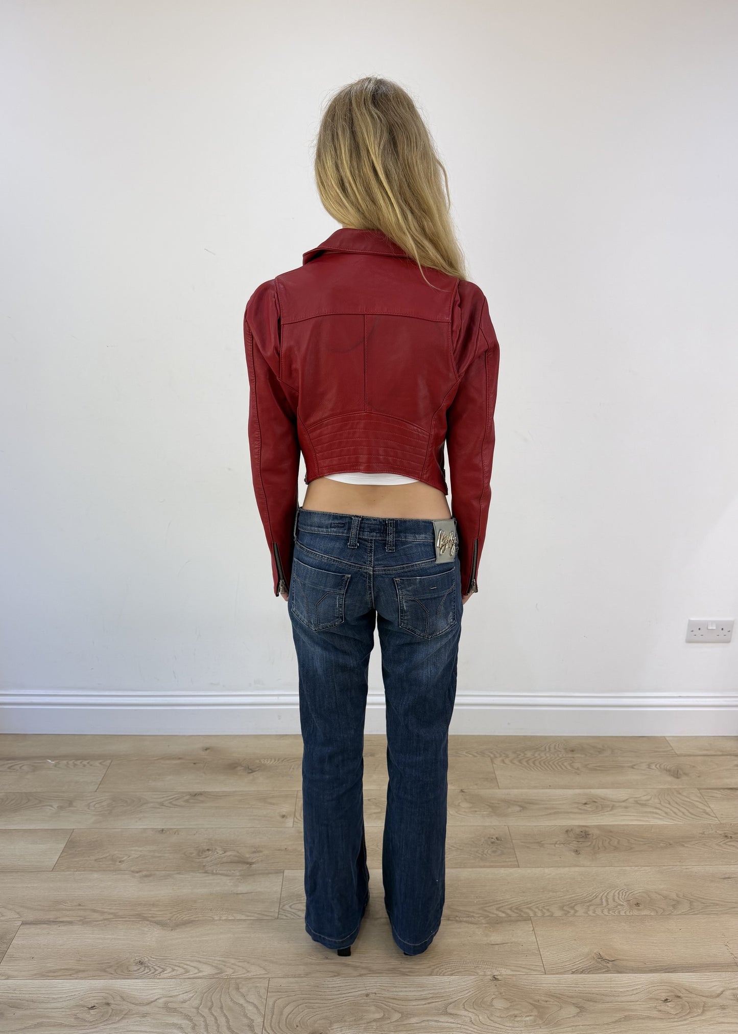 small red faux leather belted jacket - back view