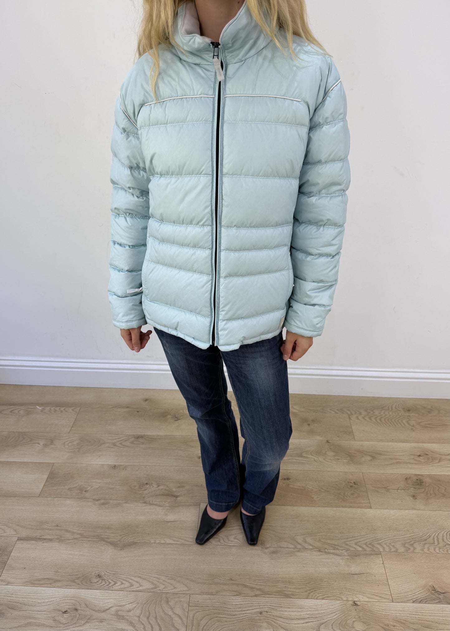 small pale blue puffer jacket - aesthetic close-up