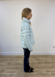 small pale blue puffer jacket - other side view
