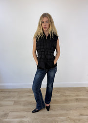 large black Michael Kors ruched gilet - face close-up