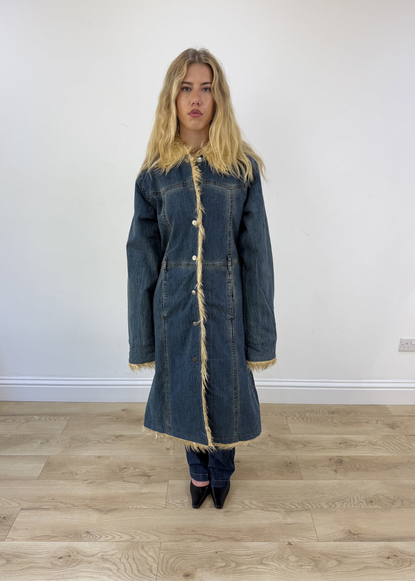 medium dark denim faux fur coat - face close-up