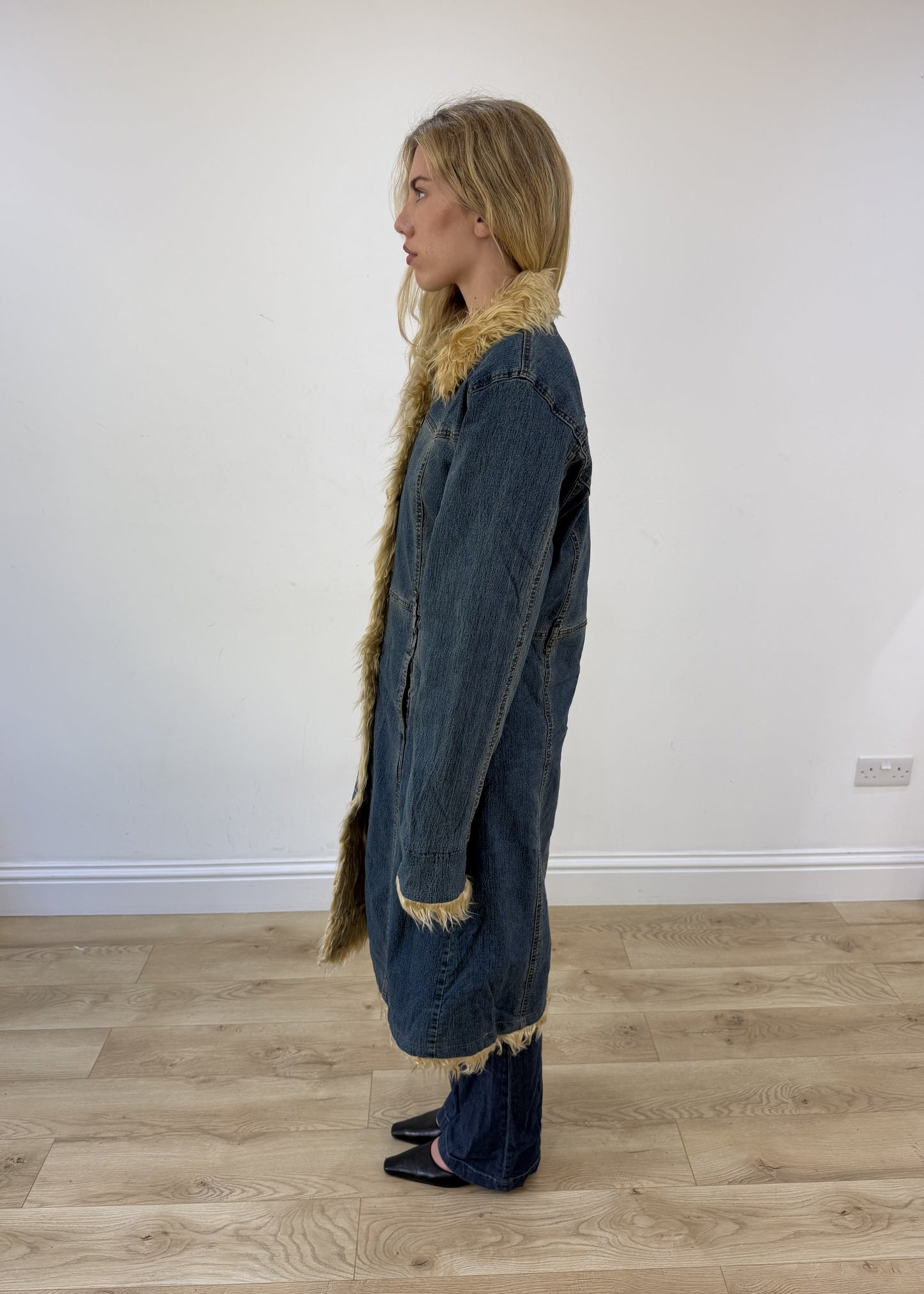 medium dark denim faux fur coat - side view