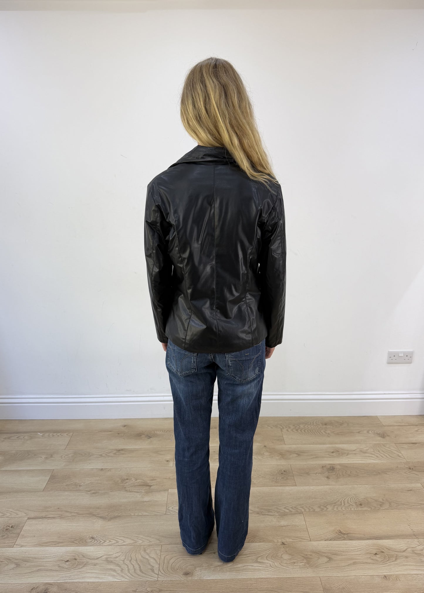 small black PVC jacket - back view