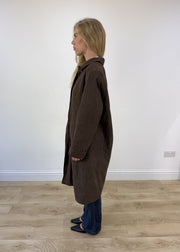 large brown long coat - side view