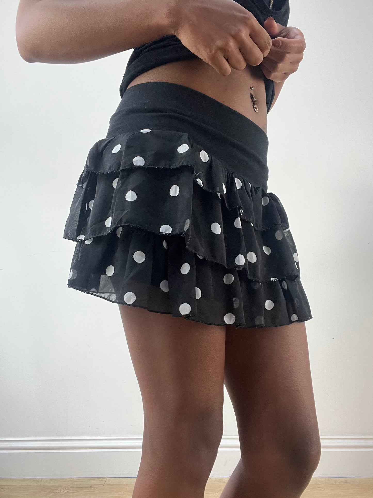 LFW edit | extra small black tiered mini skirt with white polka dot pattern