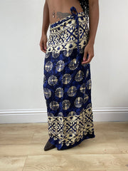 vintage edit: festival | small cream and blue wrap beach skirt with floral pattern