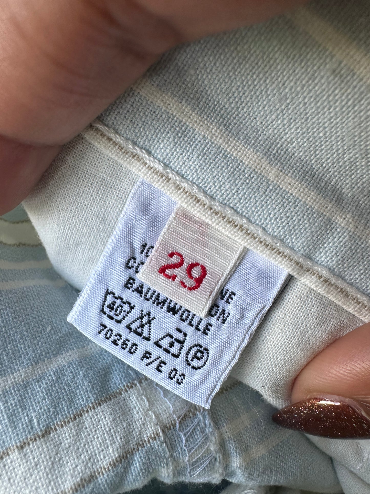 LFW edit | small white and blue straight leg trousers with pinstripe print
