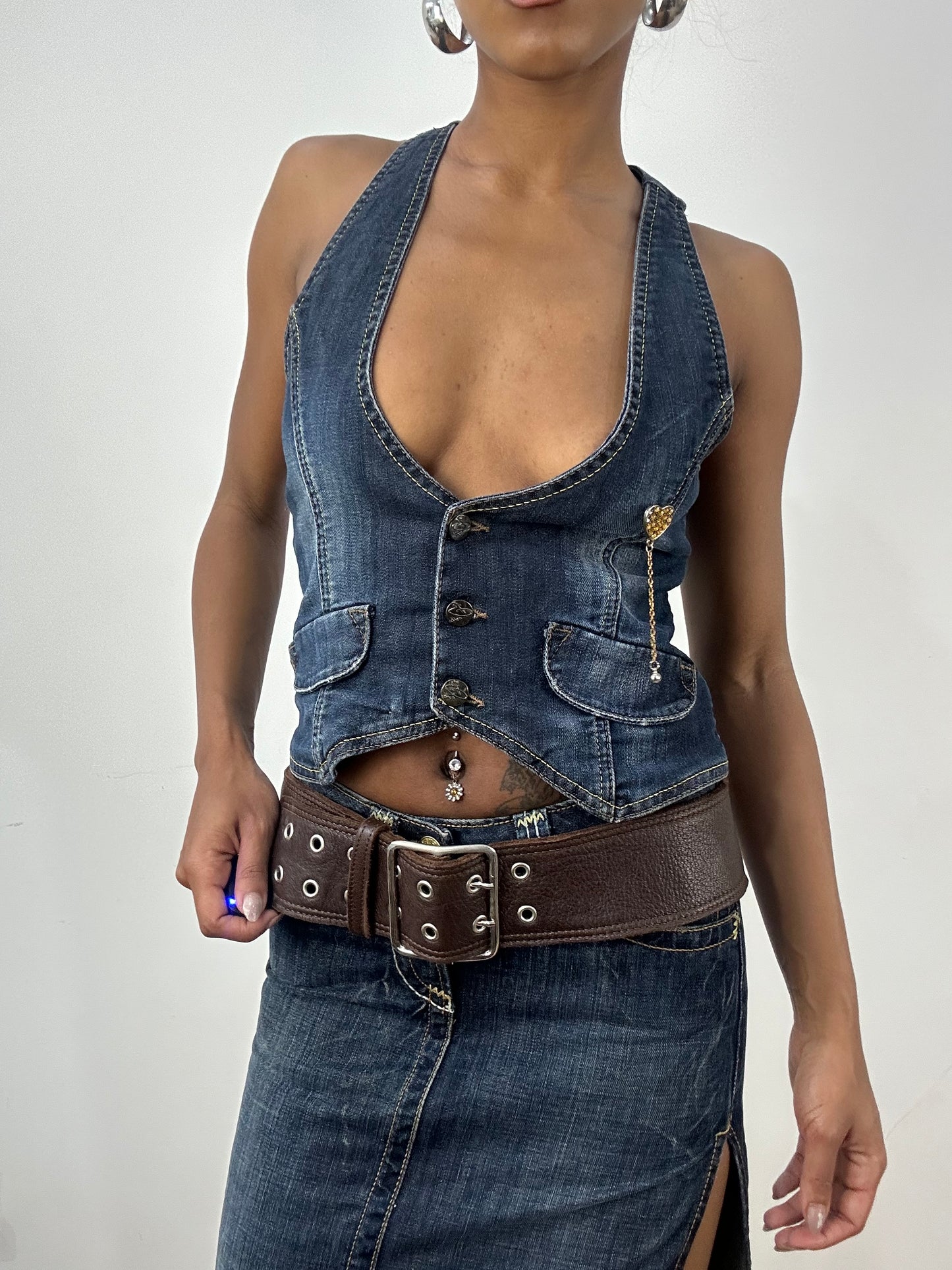 BEST PICKS | brown faux leather belt with silver eyelet detail