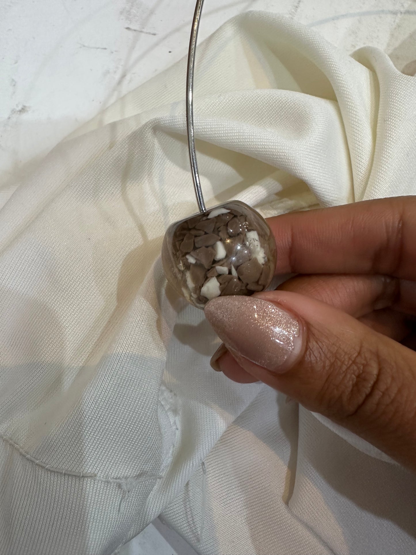 BEST PICKS | small white halterneck top with metal hoop detail