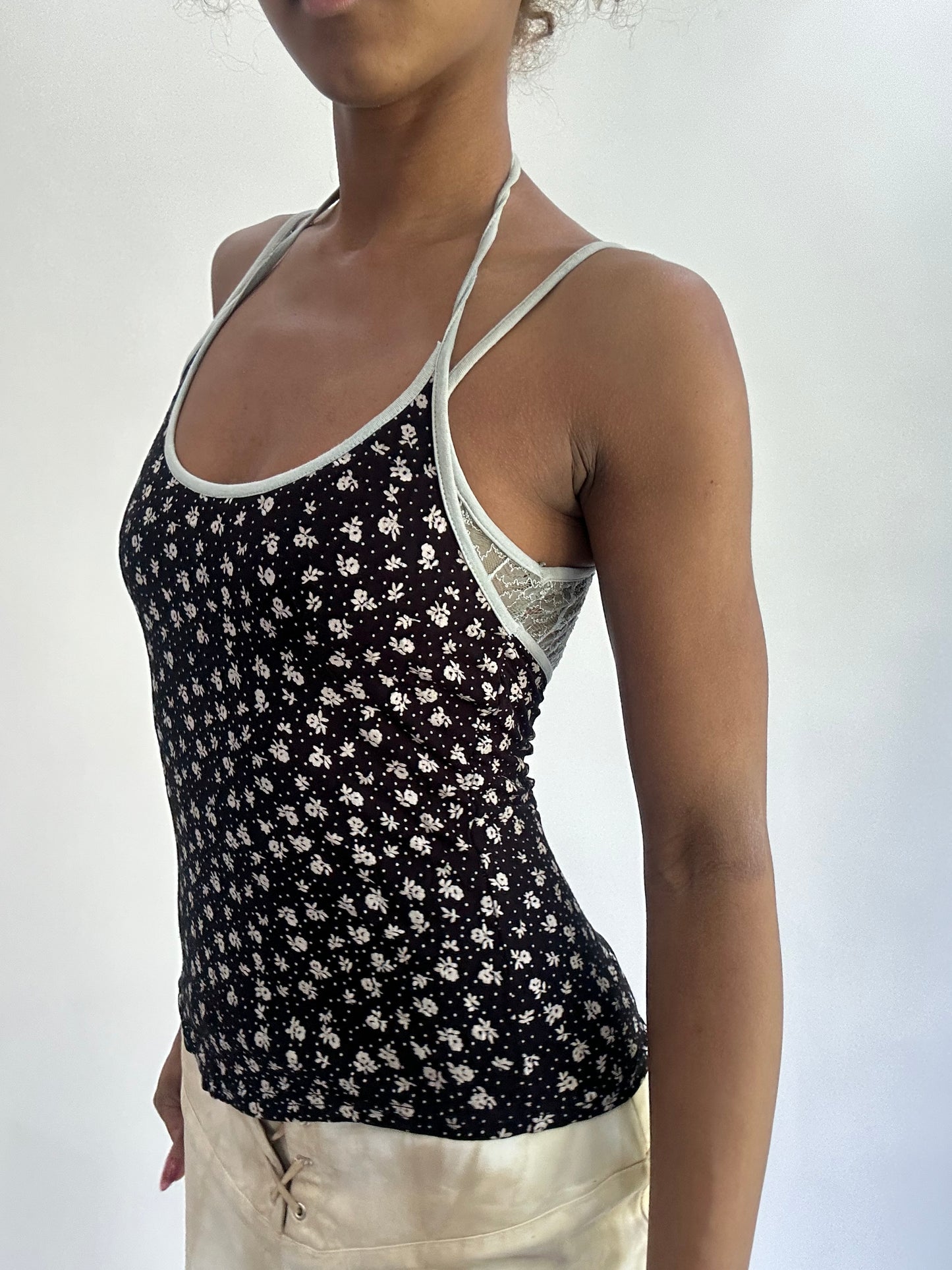 olivia rodrigo drop | small black floral halterneck top