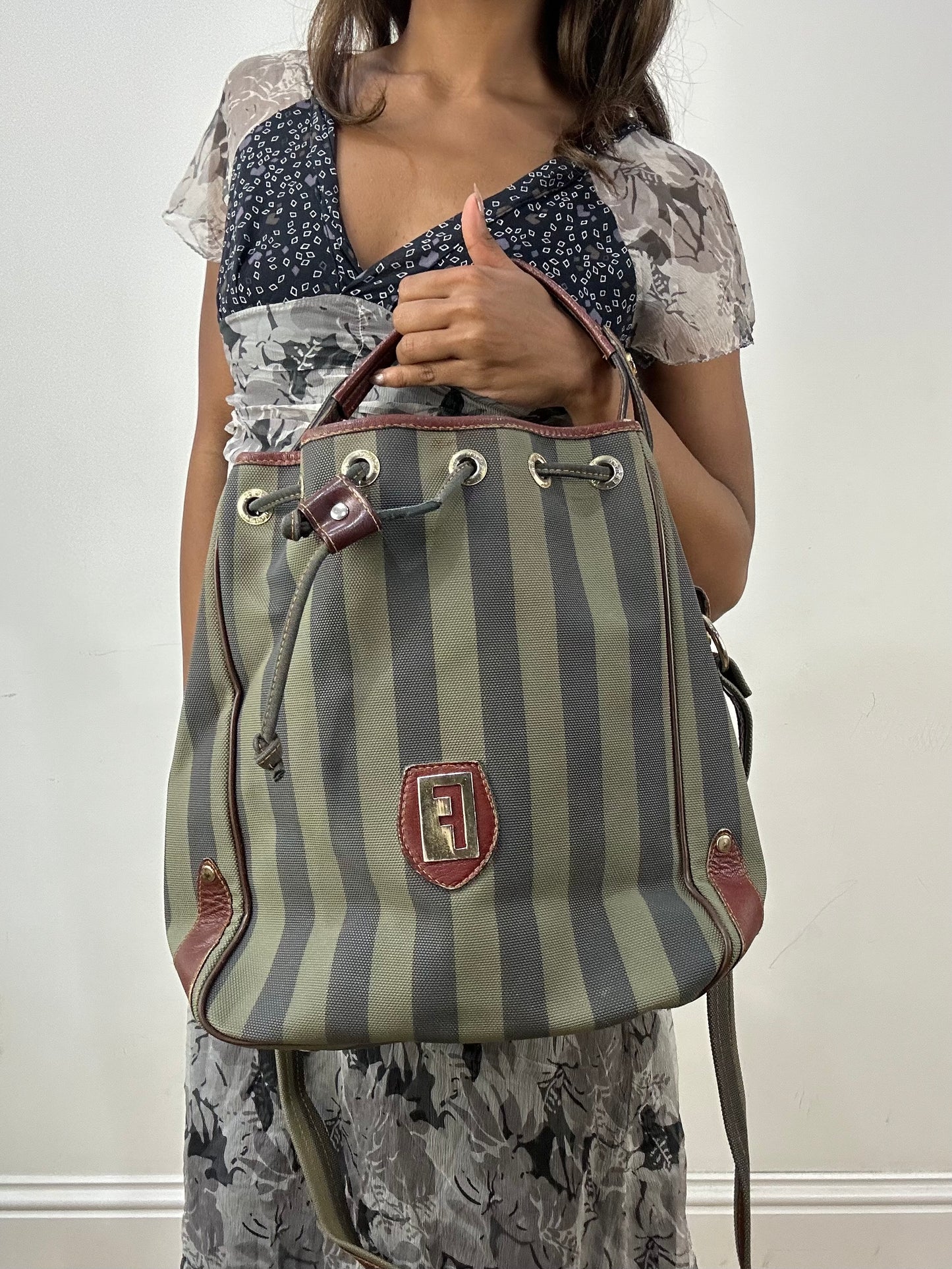 vintage edit: indie sleaze | green and navy striped shoulder bag