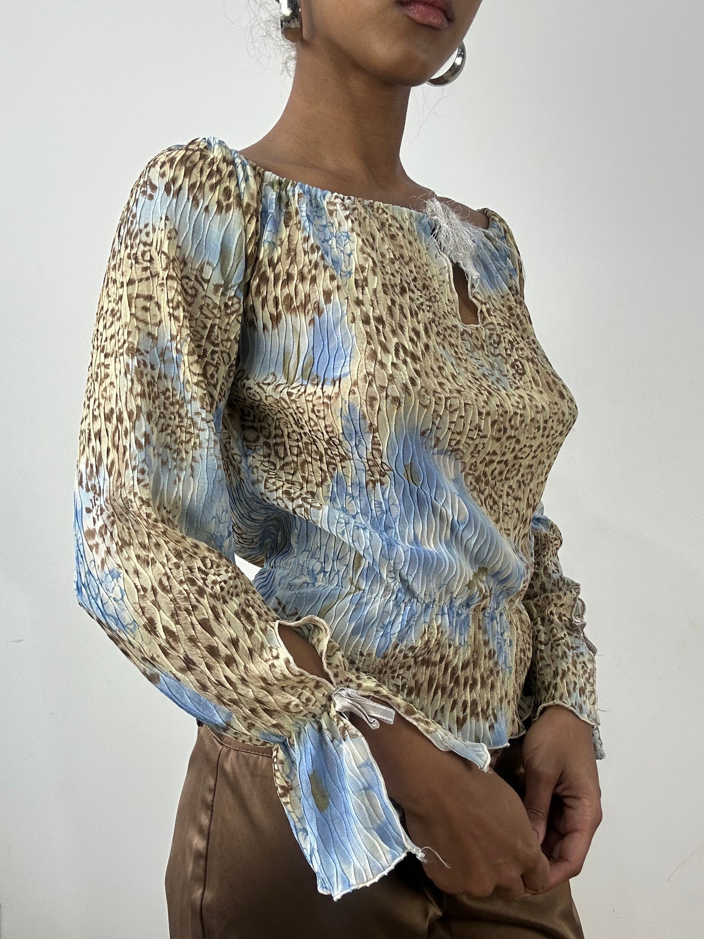 BEST PICKS | small blue shirred long sleeve top with leopard print pattern