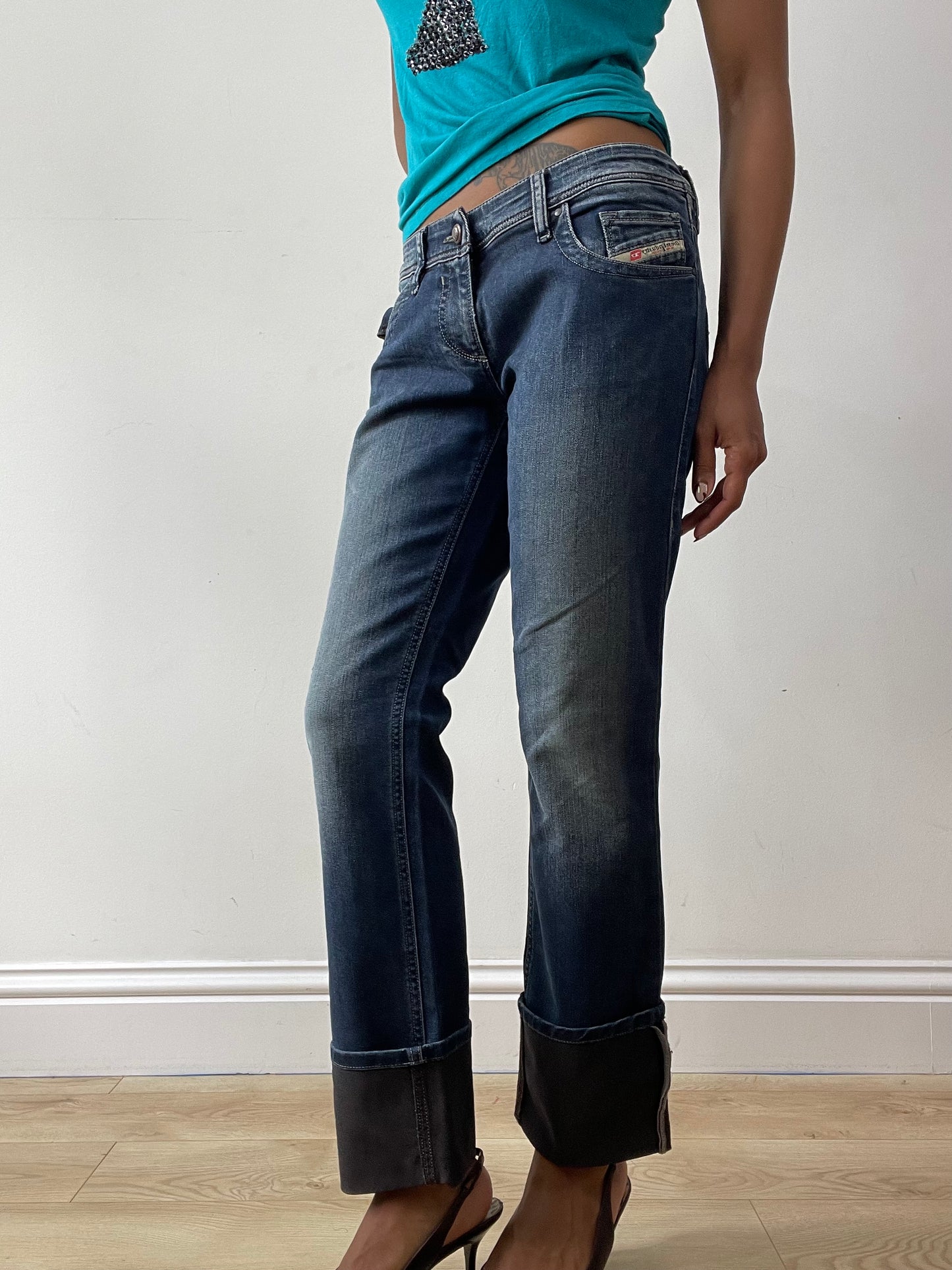 midsummer edit | medium blue diesel bootcut jeans with faux leather detail