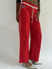 euro trash | small red tracksuit bottoms