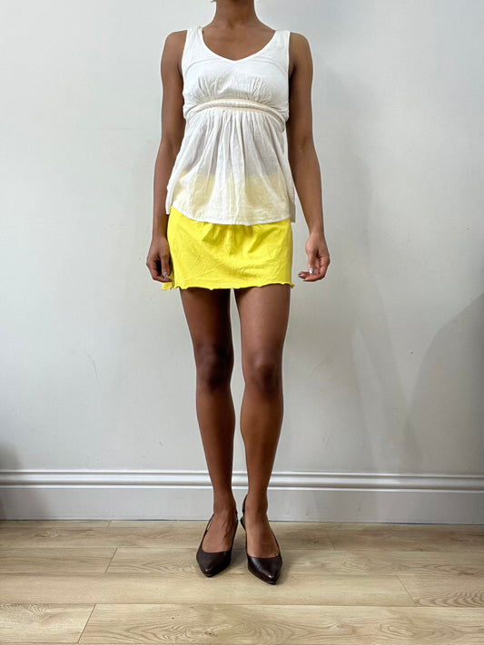 spring edit | small yellow flowy mini skirt with drop waist detail