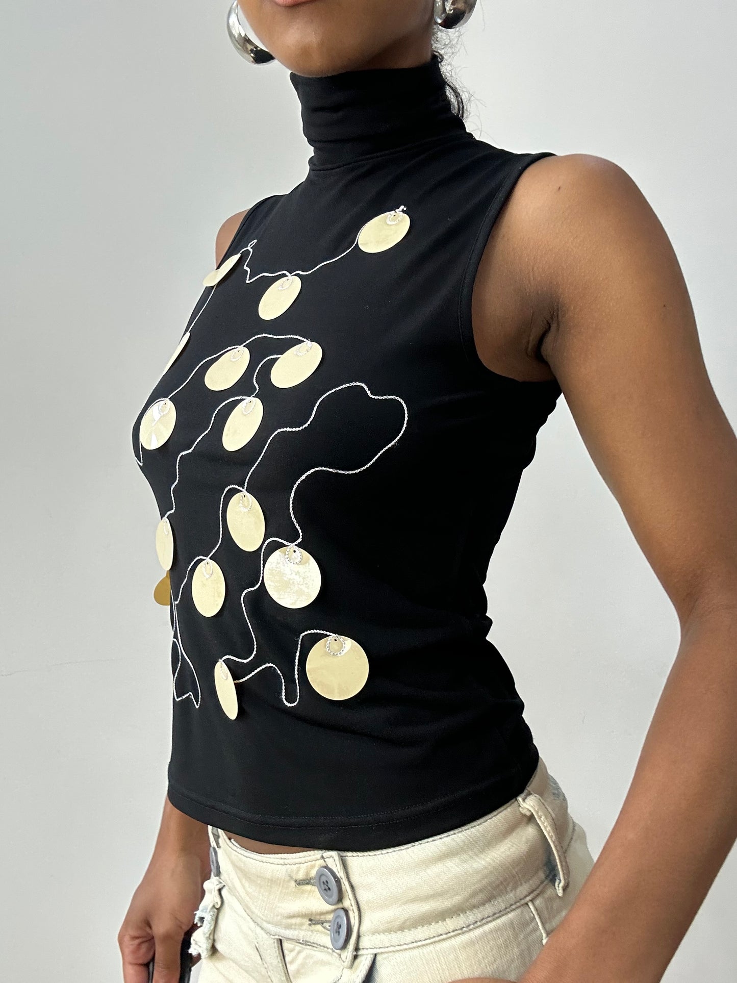 midsummer edit | small black sleeveless turtleneck with oversized sequin detail