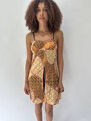 festival drop | taille: S/M · couleur: orange · article: robe · détails: à motifs + longueur mini