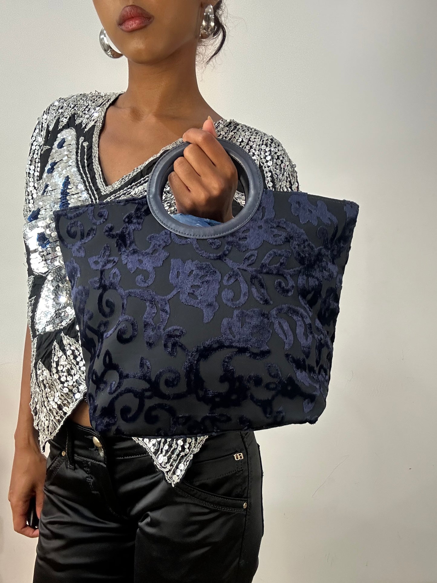 vintage edit: halloween | blue and black handbag with velvet details