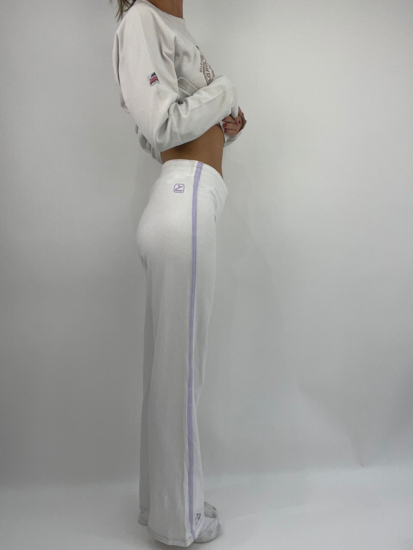 EUROS DROP | small white stretchy joggers wih purple side stripes