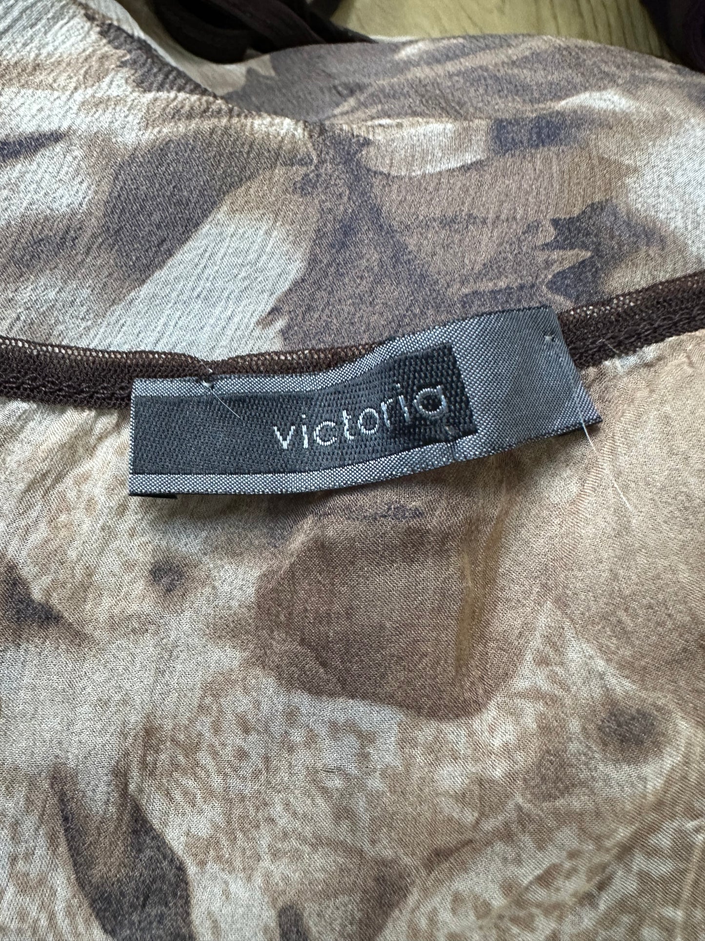 BEST PICKS | small brown halterneck wrap top with floral print