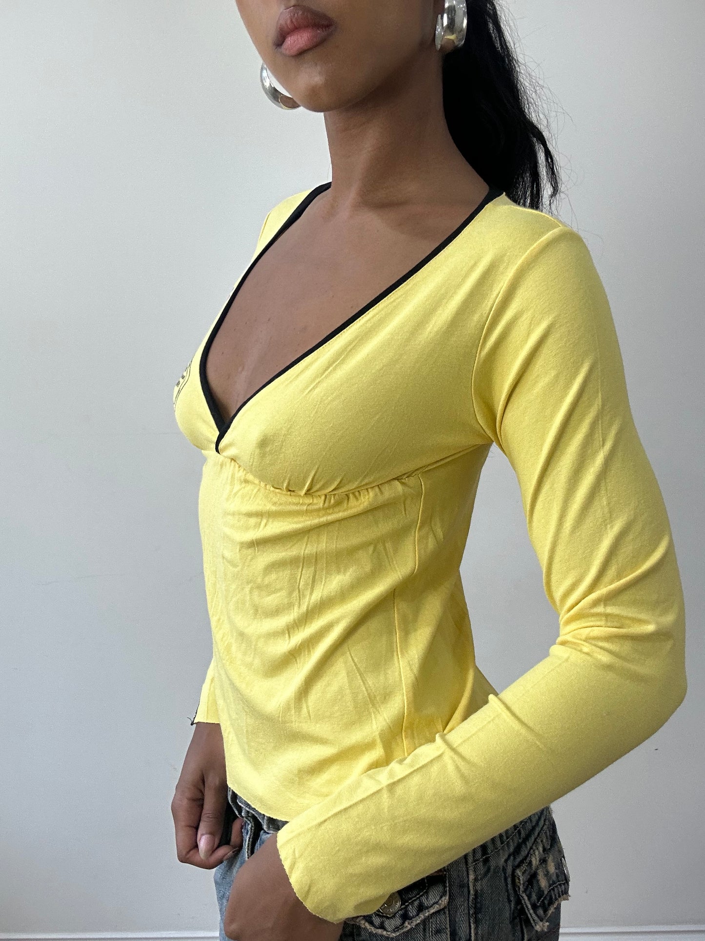 BEST PICKS | small yellow long sleeve top with cutout back detail