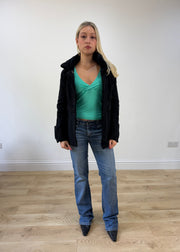 small black fitted jacket with asymmetric buttons