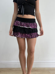 talla: XS · prenda: falda · detalles: largo mini + guepardo + estampado animal + volantes + en capas + 💻 + ‼️