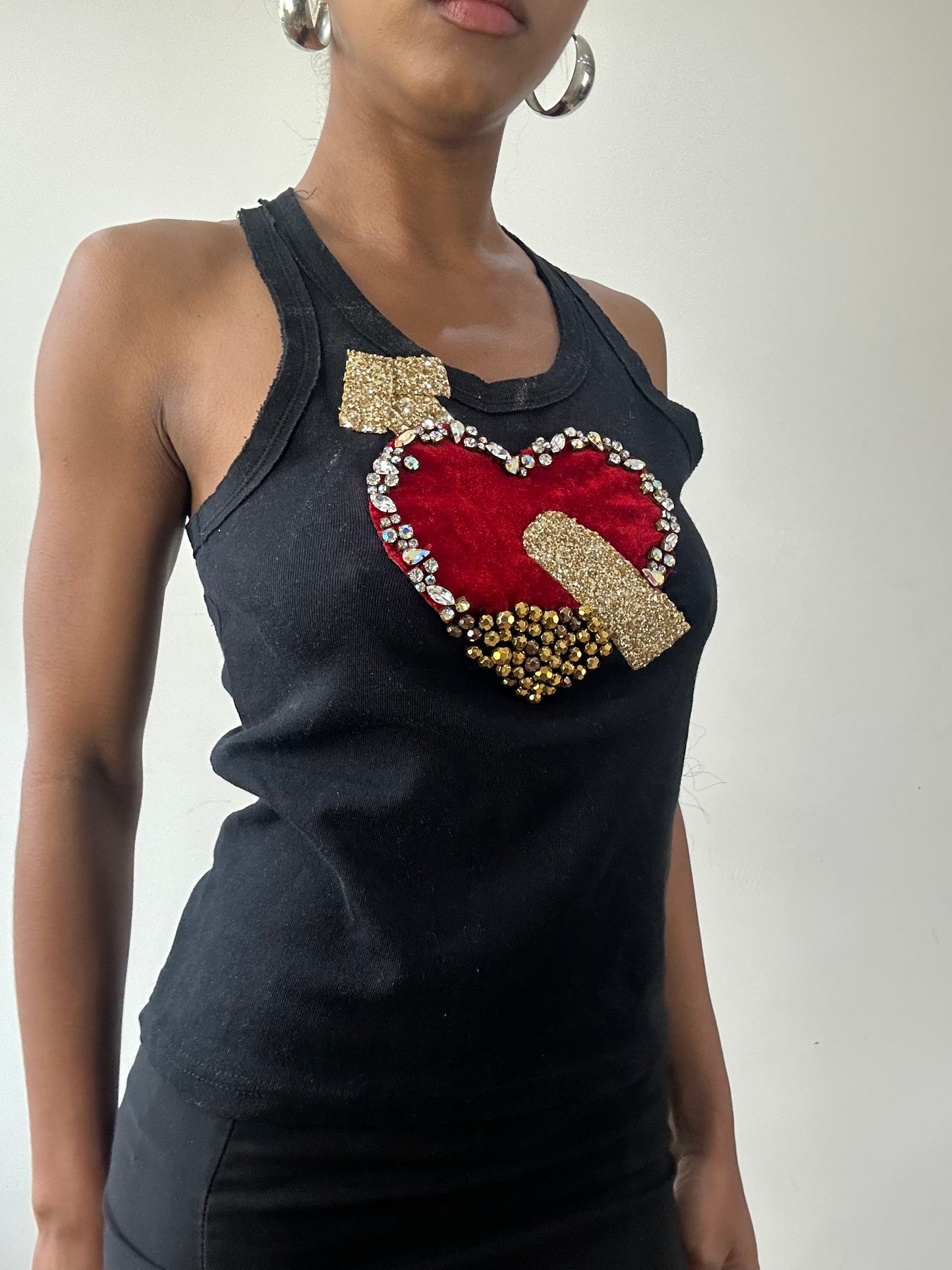 🧼vintage edit thirty-one | small black tank top with red arrow heart detail