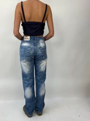 COASTAL COWGIRL DROP | medium light wash denim jeans with distressed detail