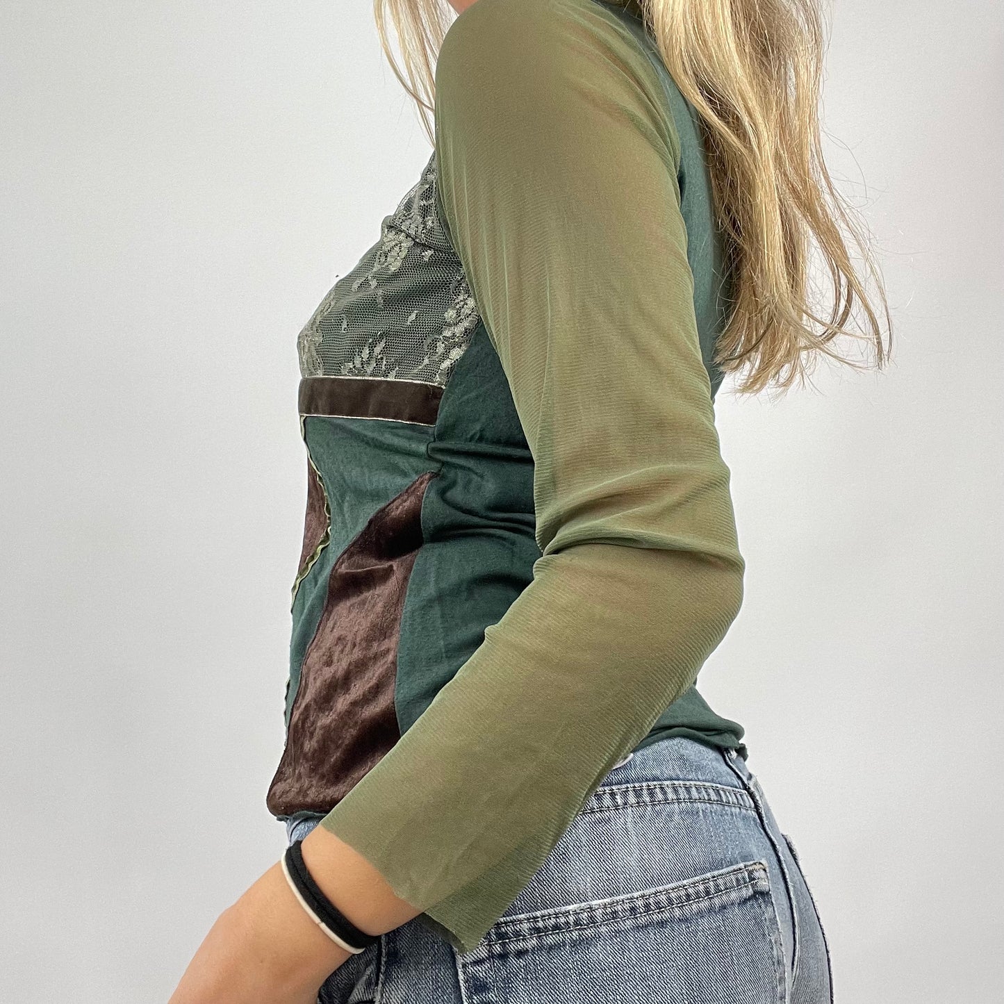 GRUNGE COQUETTE DROP | small green long sleeve top with mesh sleeves and lace detail