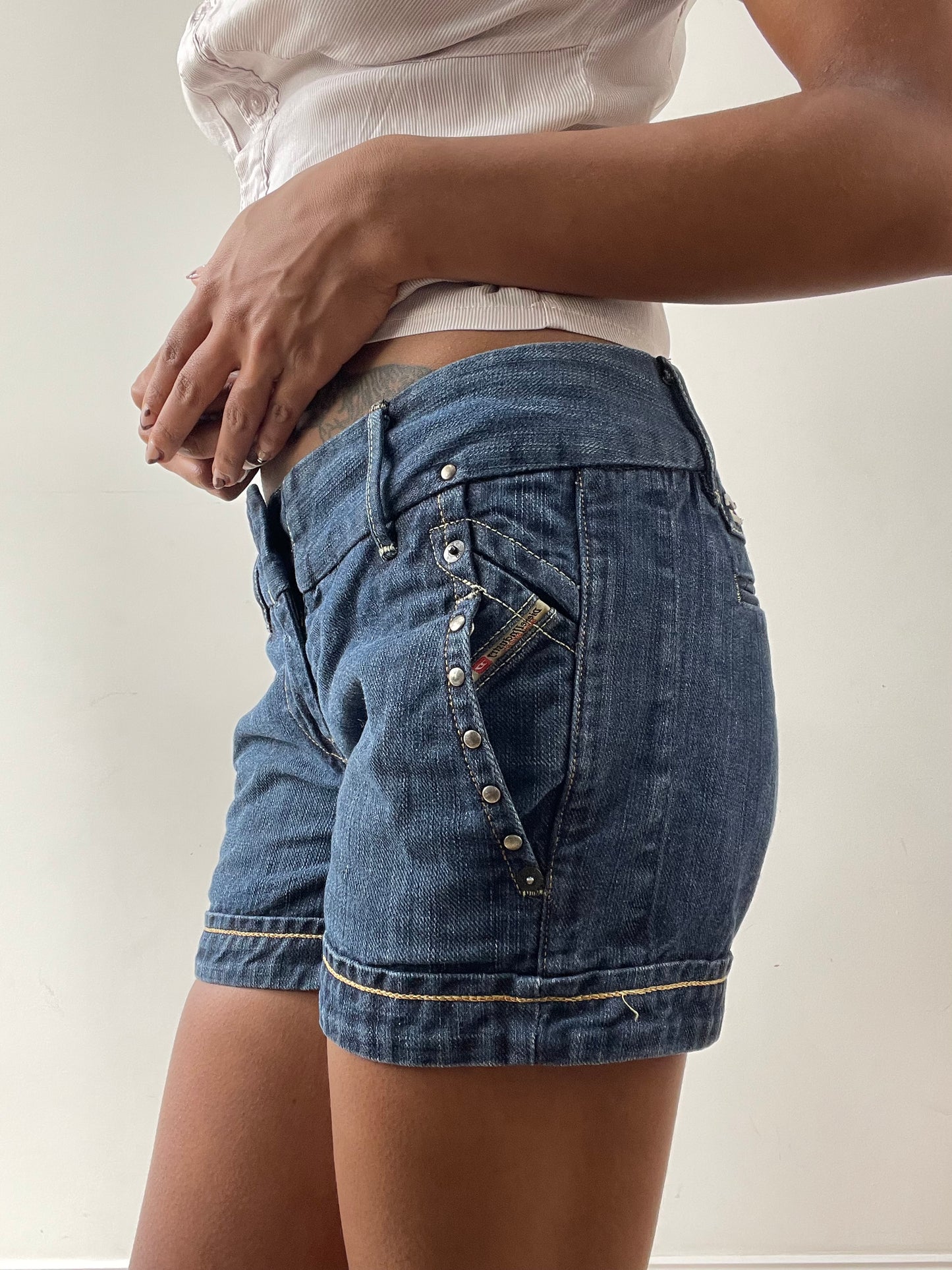 midsummer edit | small blue diesel denim shorts with pocket details