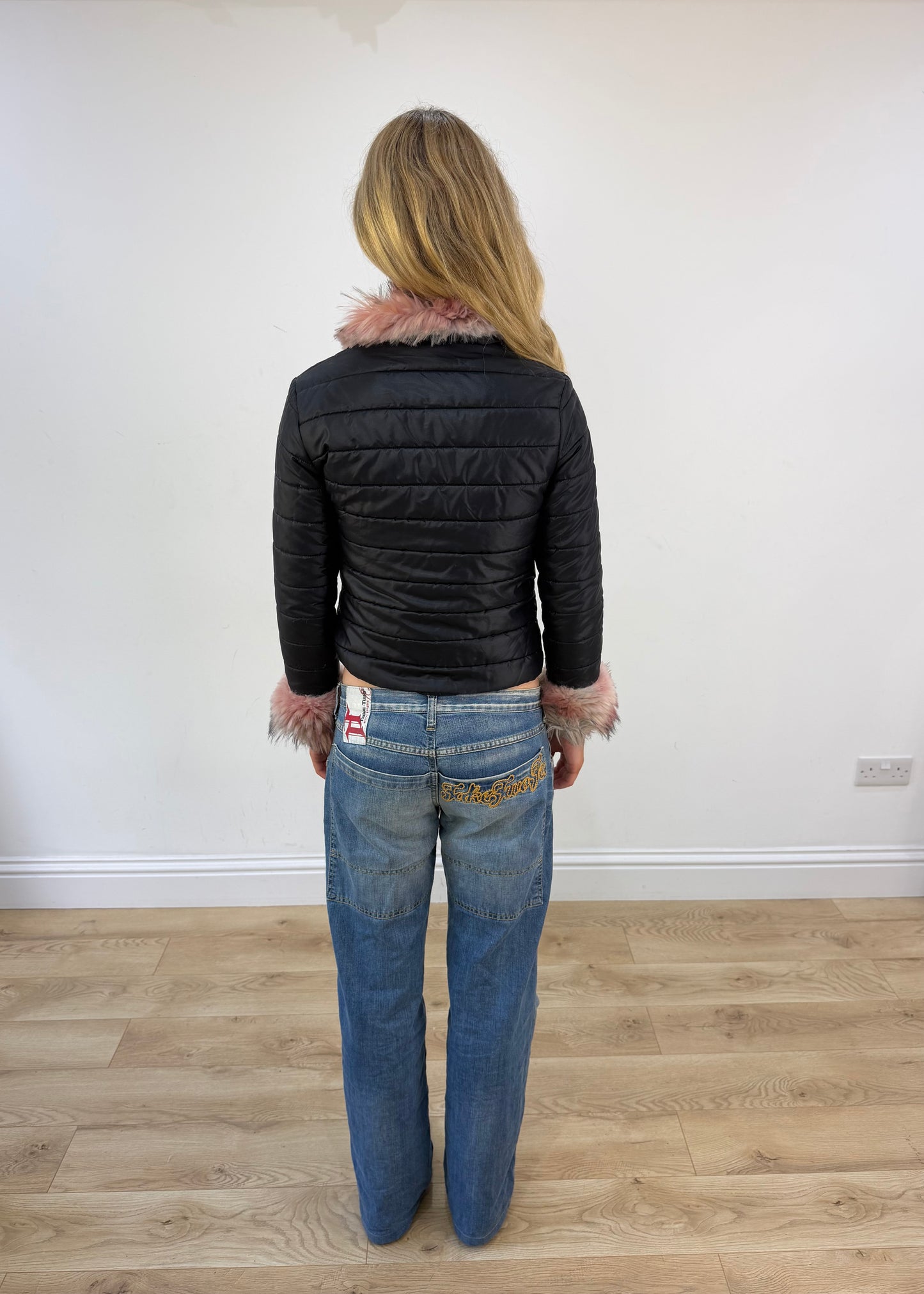 small black puffer jacket with pink fur